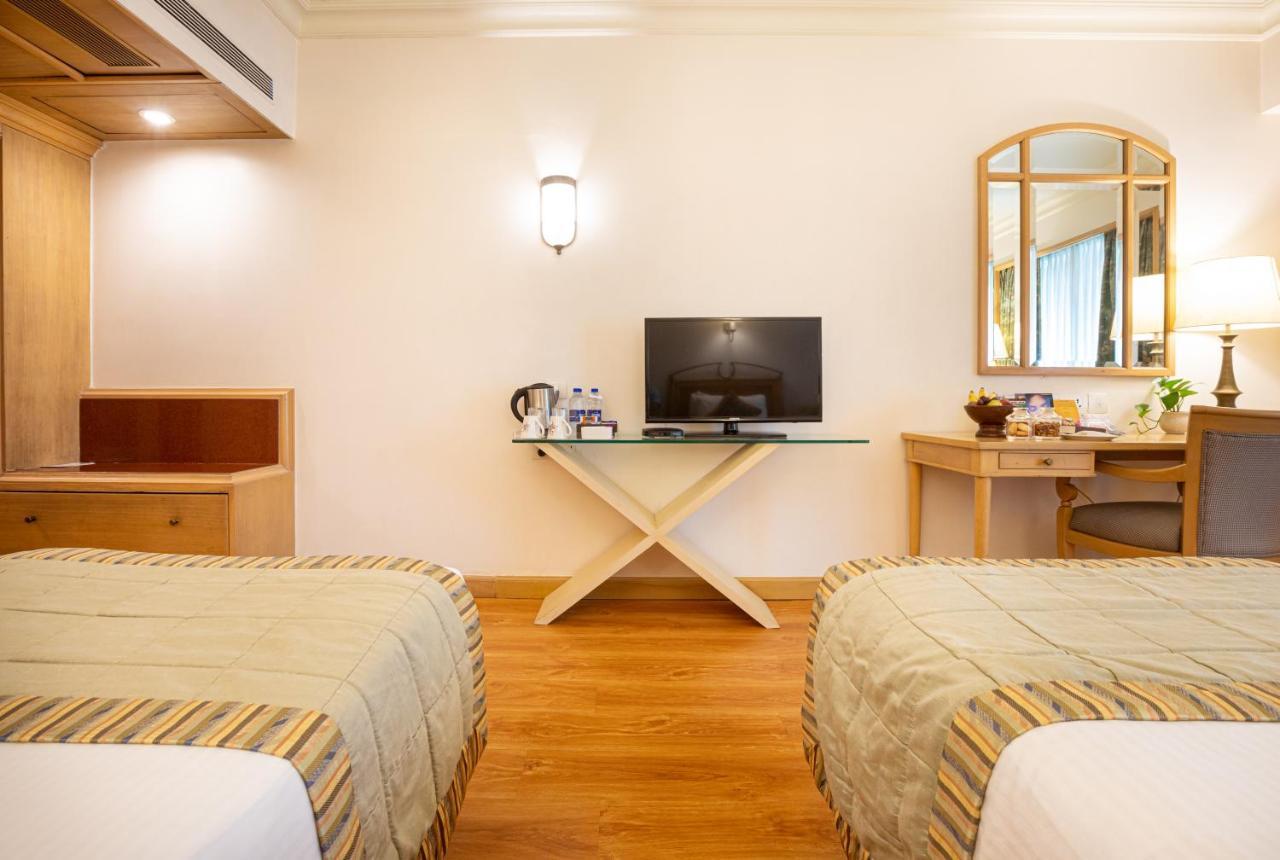 The Orchid Hotel Mumbai Vile Parle Exteriör bild A room at the hotel