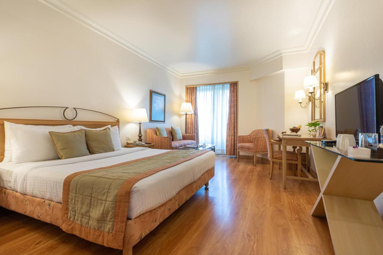 The Orchid Hotel Mumbai Vile Parle Exteriör bild A room at the hotel