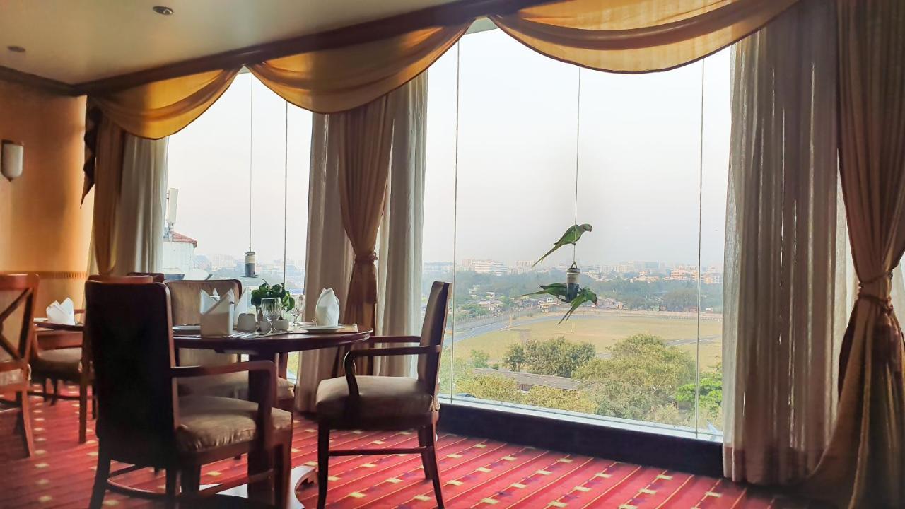 The Orchid Hotel Mumbai Vile Parle Exteriör bild Parrots at the hotel
